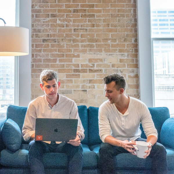 Group of workers on laptop