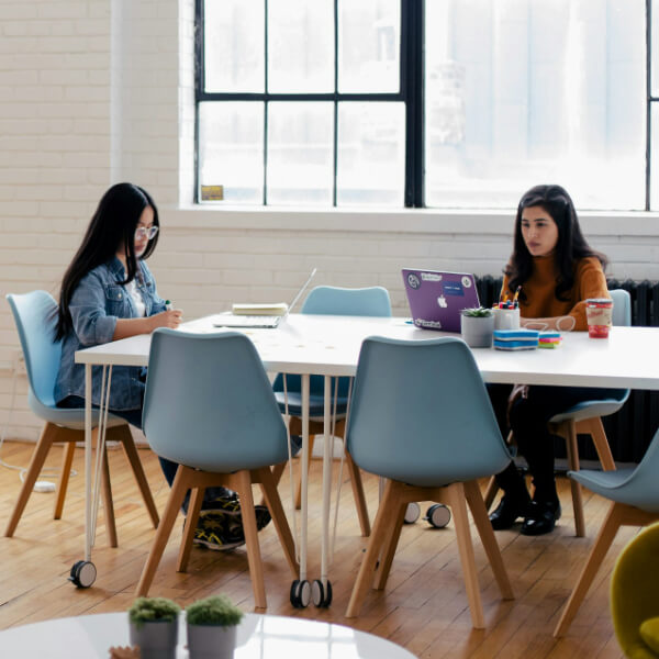 Two ladies working at desk